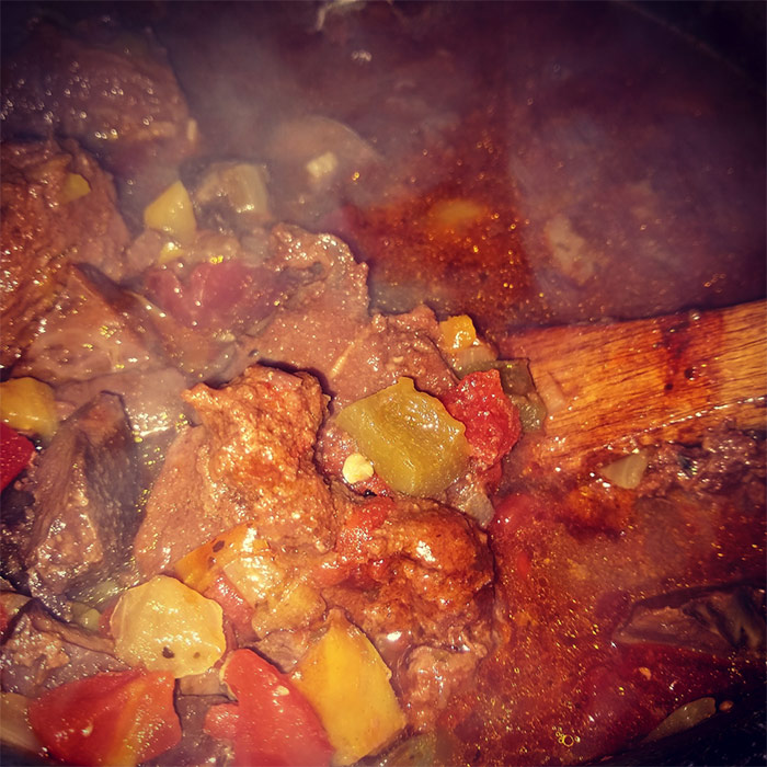 Roasted Beef Heart Chili simmering in a pot