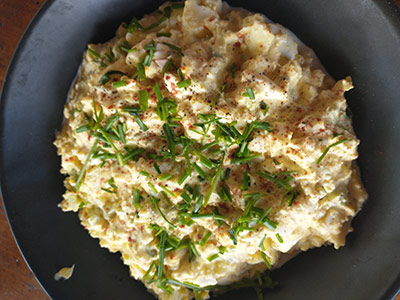 Egg Salad with Celery and garnished with Onions