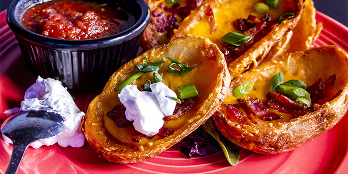 Photo of baked potato skins with homemade ketchup and sour cream